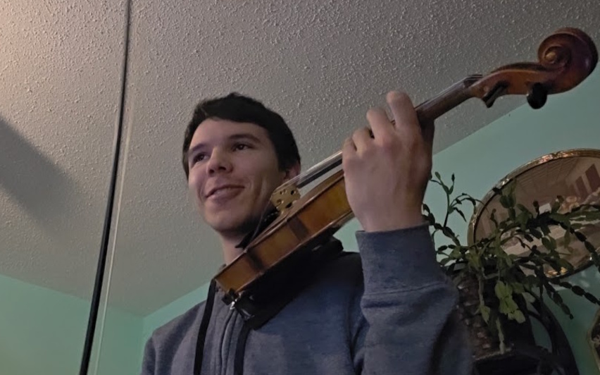 David Vytopil/irmonus Playing Violin Close Up while smiling